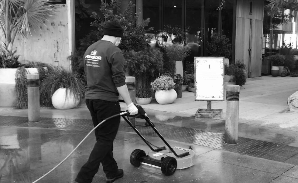 Power washing surface cleaner in action